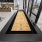 shuffleboard table in bright clubhouse