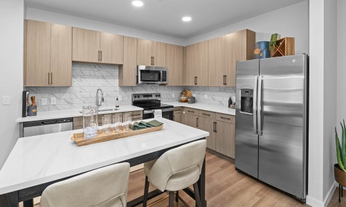 Spacious kitchens with thoughtful details kitchentable/island in open concept kitchen